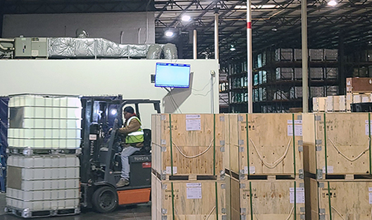 Chemical warehousing services of material stored in caged IBC totes and wood crates