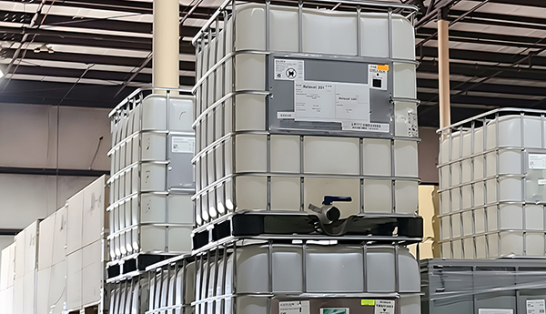 Caged IBC totes in one of ASW's warehouse locations.