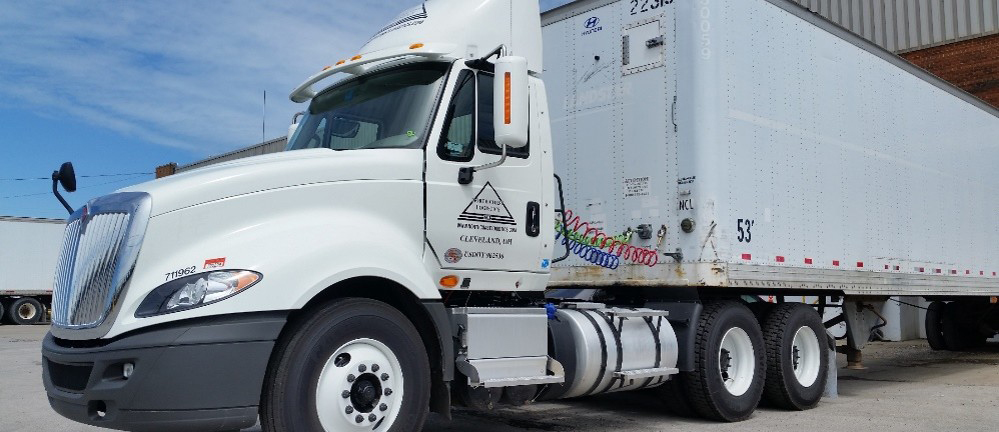An ASW contract-carrier truck at loading bay